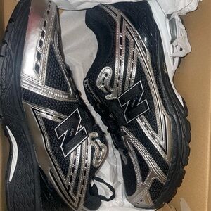 New Balance Black and Silver Athletic Shoes